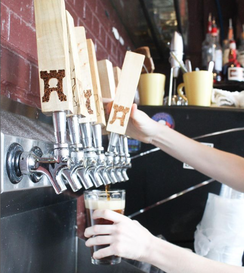 Bartender making drinks.