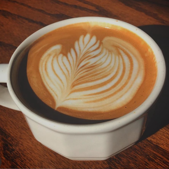 Cup of coffee with foam design