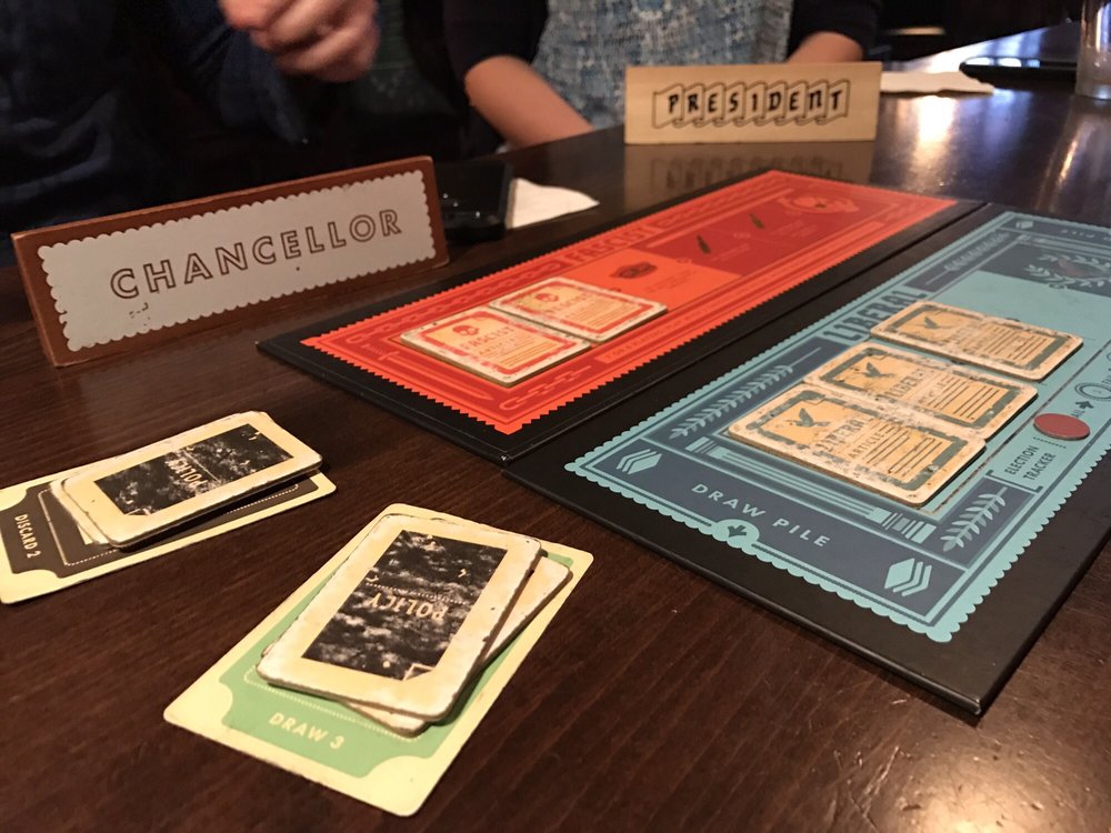 Game board with cards on a table.